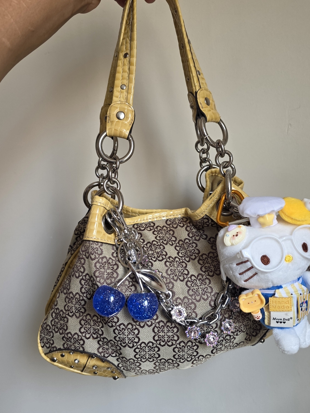 Kathy Van Zeeland Yellow Trim Brown Patterned Shoulder Bag with Blue Charm